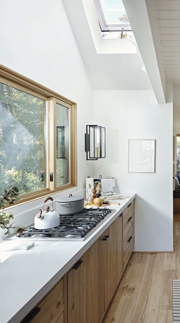 Kitchen skylights blond wood black island feat 2 e1763150442514